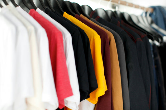 Close-up of hanged shirts on a rack showing quality and condition